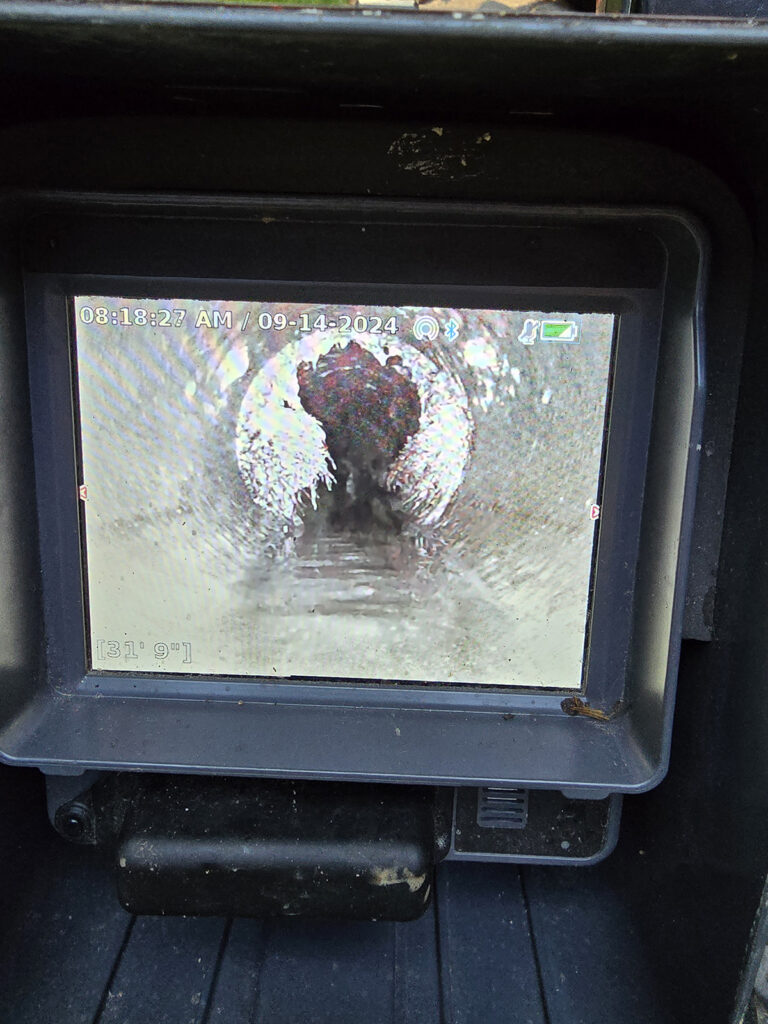 Close up of a Drain Inspection Camera's display screen as Prostream Mechanical Plumbers completed a drain inspection for a client